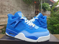Air Jordan 4 Retro "Royal Blue Gold" Sneakers