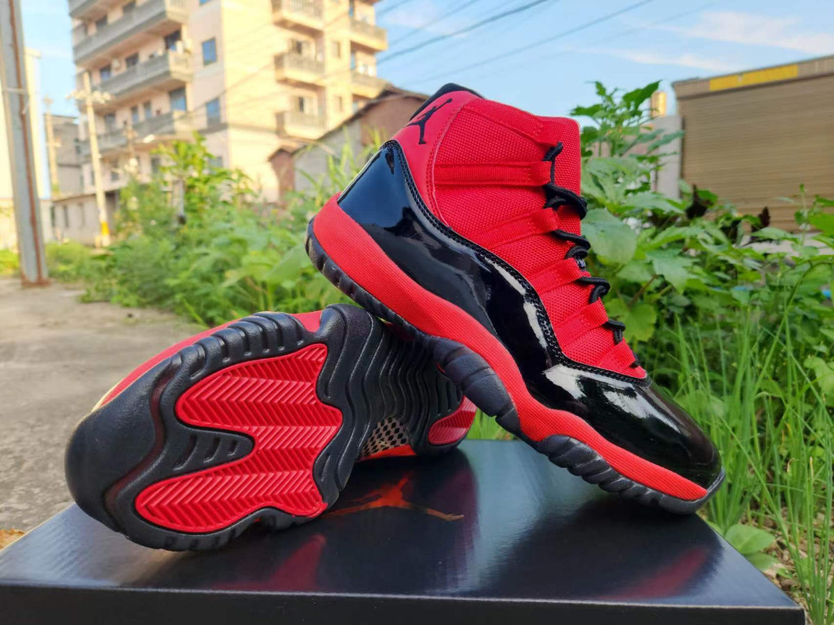 Air Jordan 11 Red & Black Sneakers | Crimson Undertow