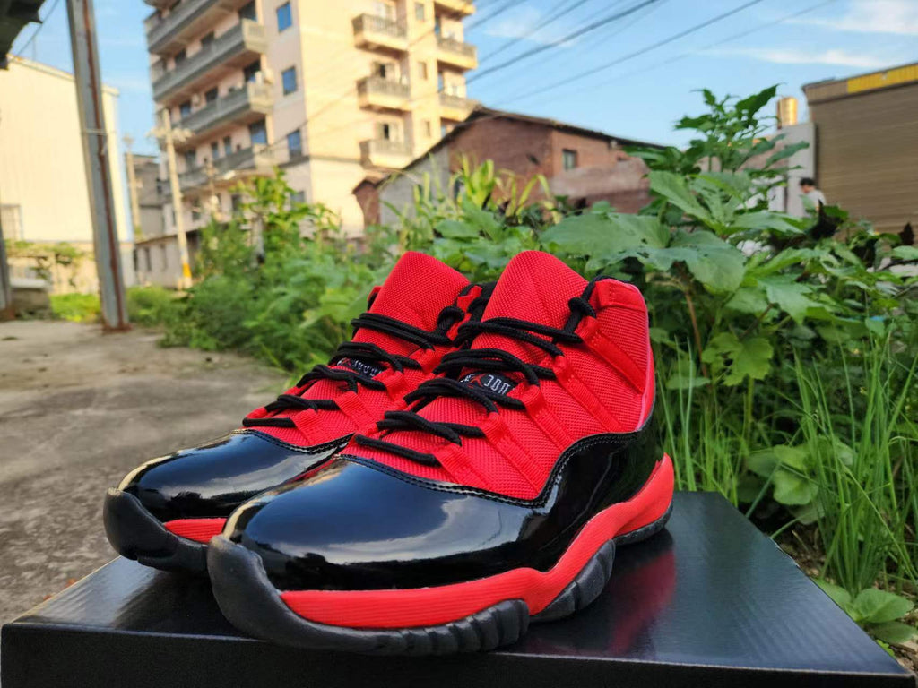 Air Jordan 11 Red & Black Sneakers | Crimson Undertow