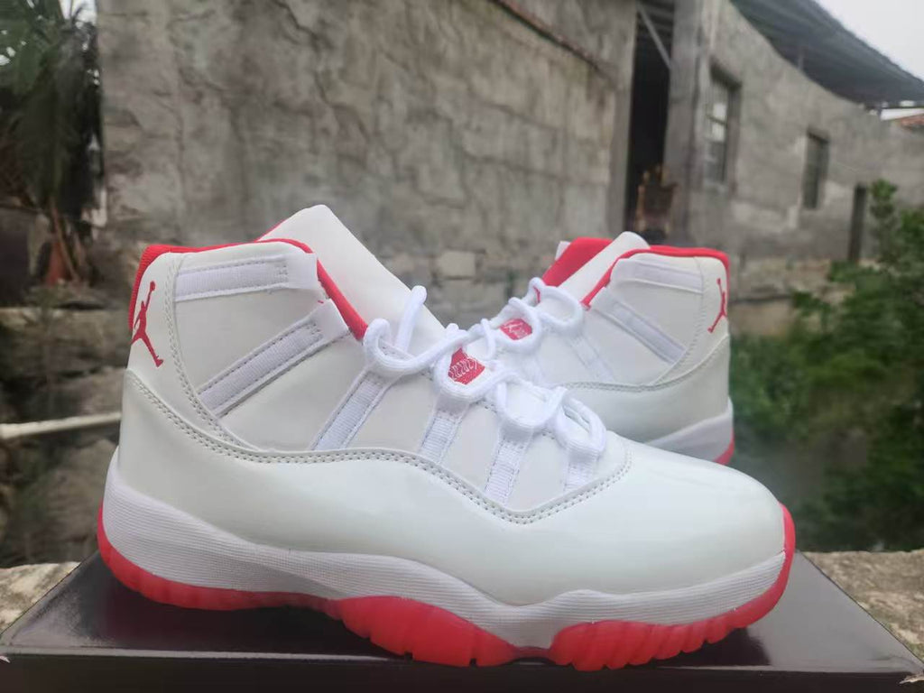 Air Jordan 11 White & Red Sneakers | Vermilion Skyline