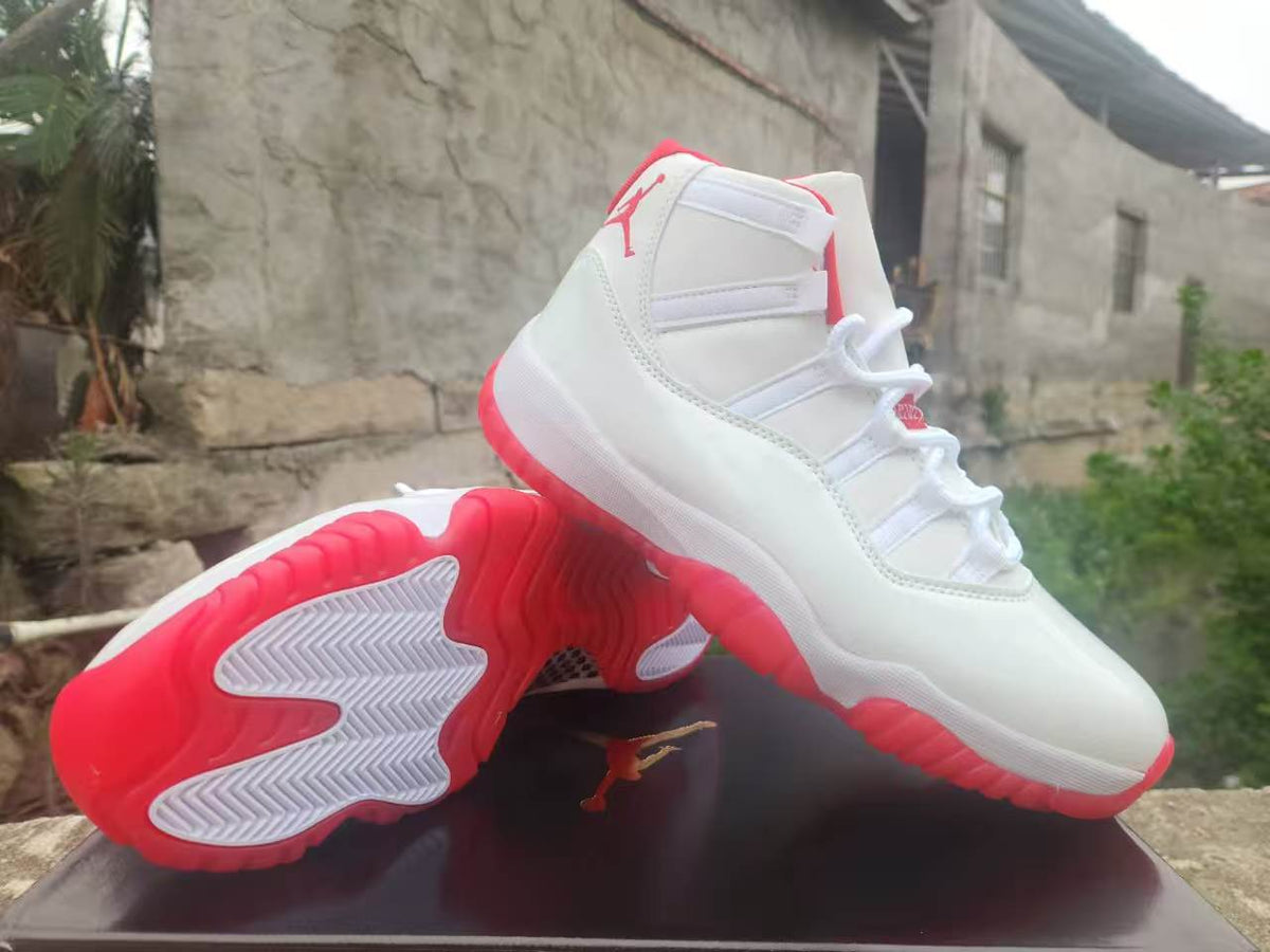 Air Jordan 11 White & Red Sneakers | Vermilion Skyline