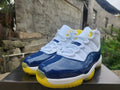 Air Jordan 11 White/Blue/Yellow Sneakers | Daybreak Compass